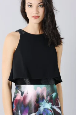 Abito con gonna fantasia e crop top
