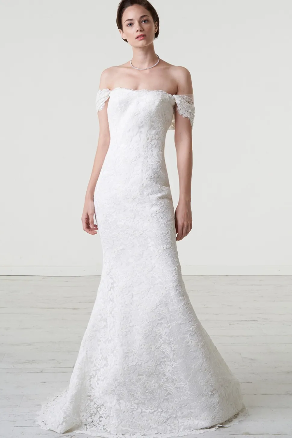 Abito da sposa a sirena in pizzo macrame off shoulder