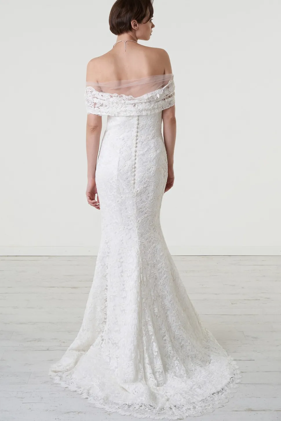 Abito da sposa a sirena in pizzo macrame off shoulder