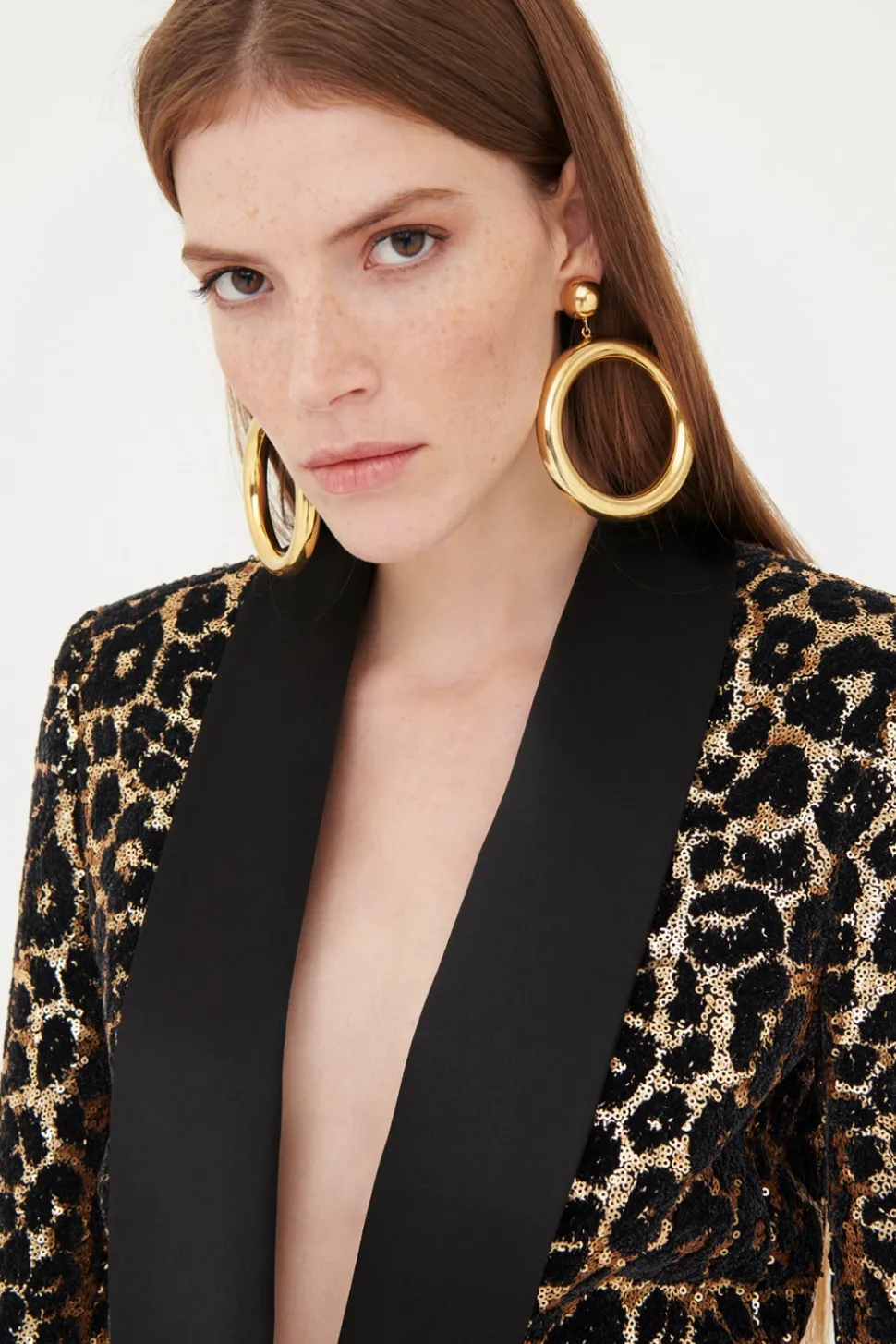 Completo in paillettes leopardato