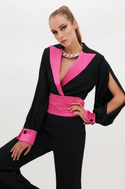 Jumpsuit con dettagli fucsia